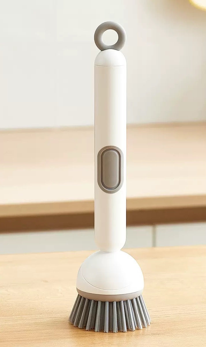 Diskborste med diskmedelsbehållare